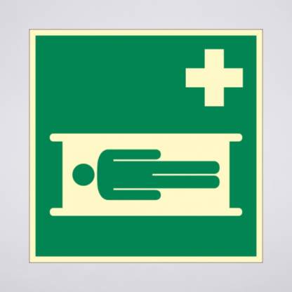 grünes Rettungszeichen mit Hinweis auf Krankentrage